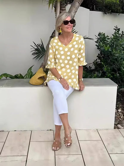 Lucienne – Blusa elegante con scollo a V