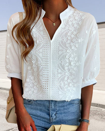 Blusa con scollo a V e maniche a palloncino con pizzo