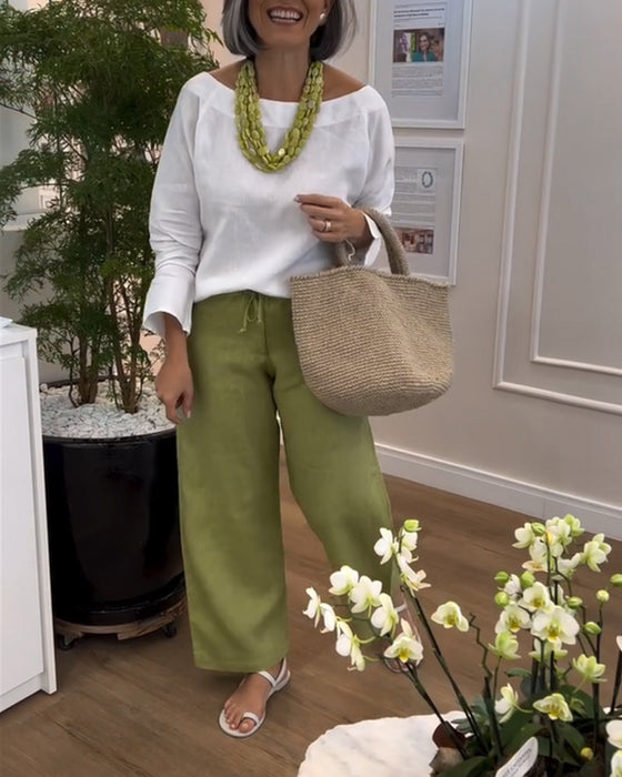 T-shirt bianca di collo rotondo con maniche lunghe + Pantaloni casual larghi verdes