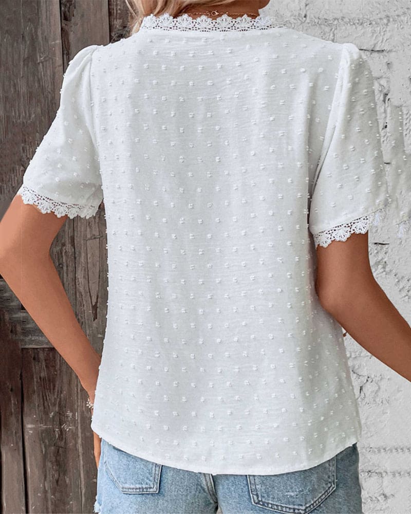 ZOE | Blusa in pizzo di maniche corte con scollo a V