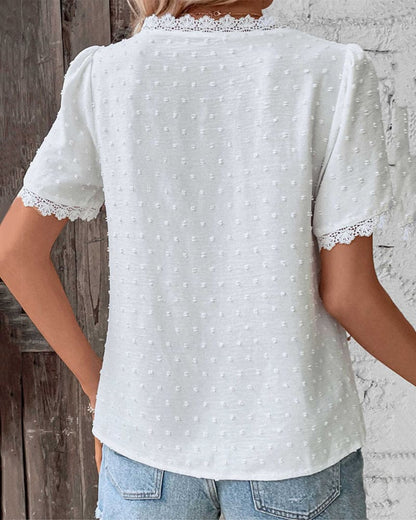 ZOE | Blusa in pizzo di maniche corte con scollo a V
