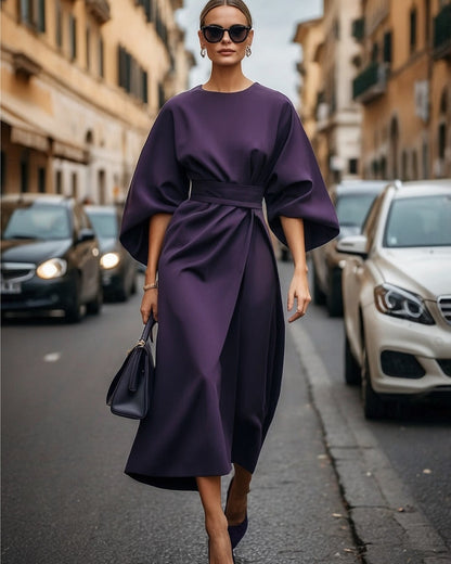 Abito elegante con maniche abullonadas