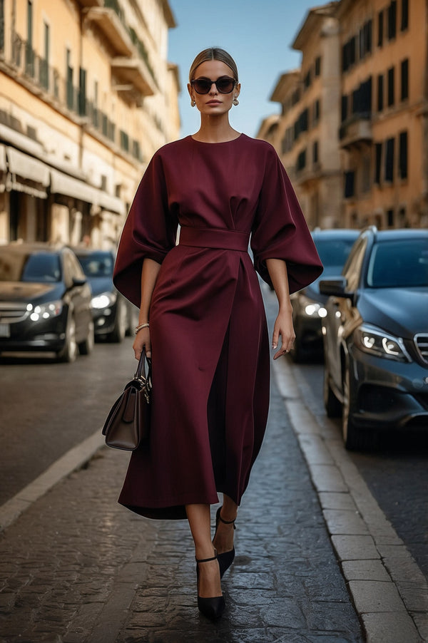 Abito elegante con maniche abullonadas