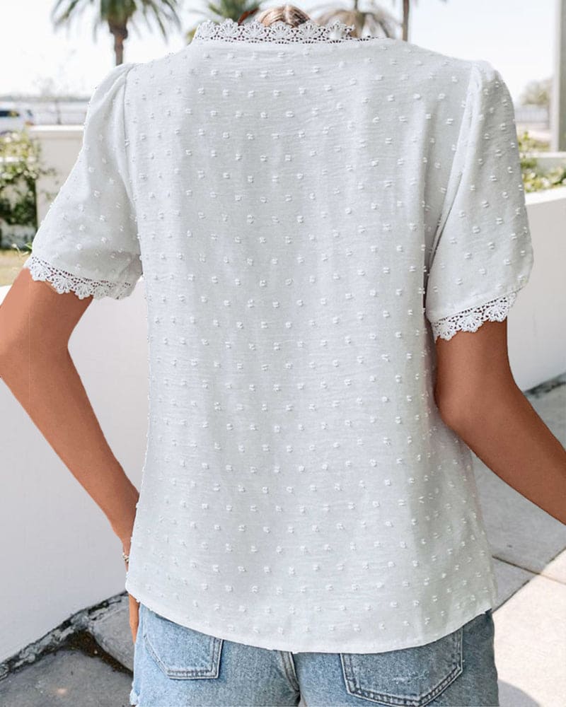 ZOE | Blusa in pizzo di maniche corte con scollo a V