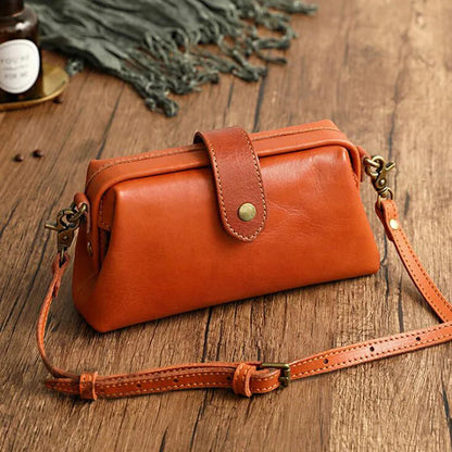 Herdis | Borsa Classica e compatta in calda tonalità cognac