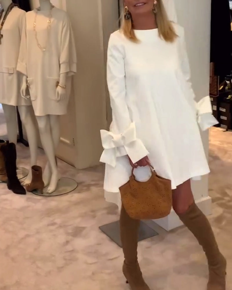 NIA – ABITO MINI CON MANICHE DI LAZO ELEGANTE