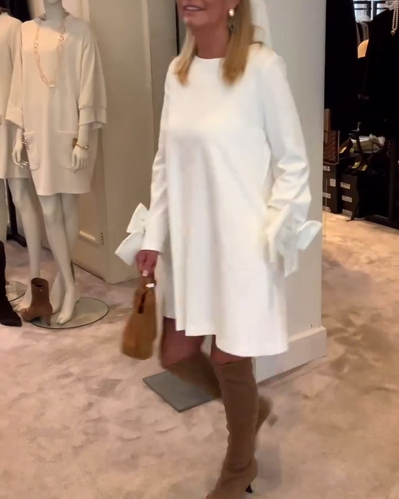 NIA – ABITO MINI CON MANICHE DI LAZO ELEGANTE