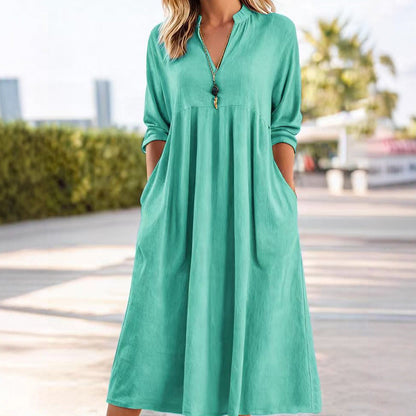Abito midi Fluido con Vita Imperio e scollo a V – Eleganza Raffinata