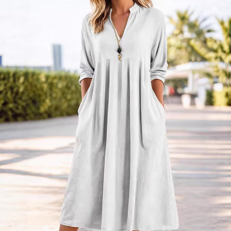 Abito midi Fluido con Vita Imperio e scollo a V – Eleganza Raffinata